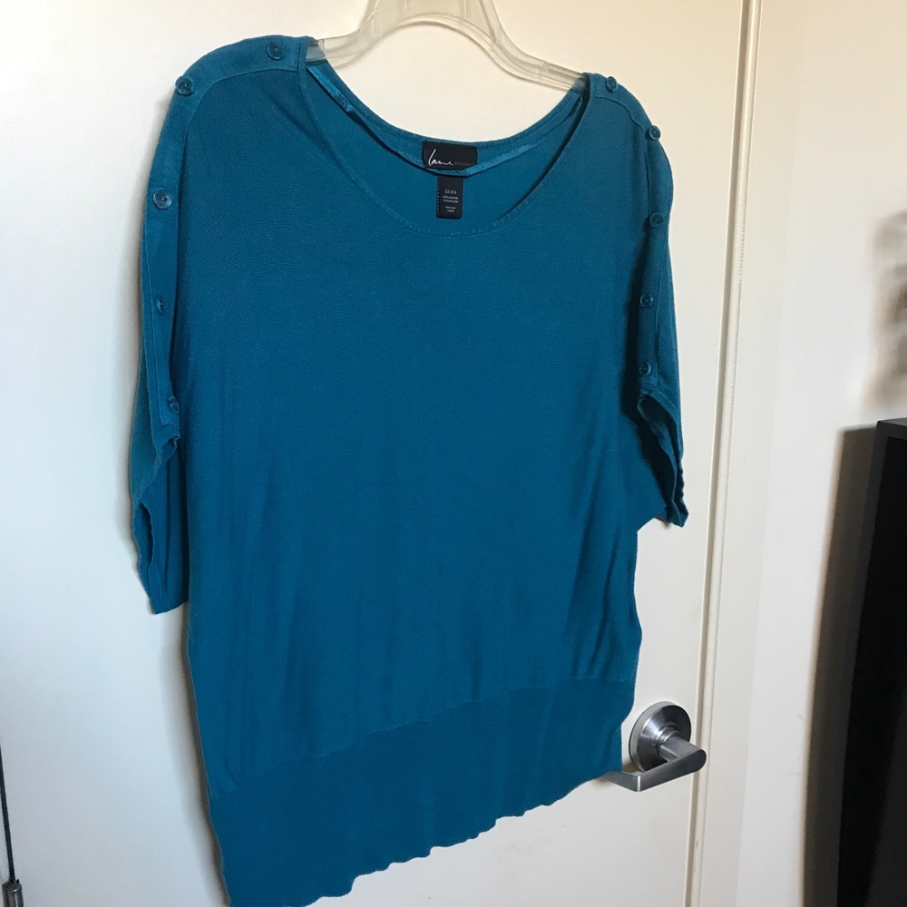 Gently worn teal sweater shirt.